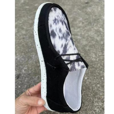 China Western Black Cowhide Round Hair-on Wholesale Unisex Round Toe Canvas Slip On Loafers Shoes For Women And Men for sale