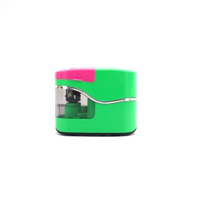 China Small portable green battery powered pencil sharpener convenient for office and home for sale