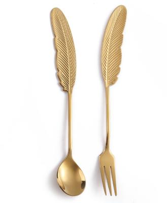 China Sustainable Retro Vantage Feather Gold Stirring Coffee Dessert Ice Cream Scoop Fork Stainless Steel Spoons for sale