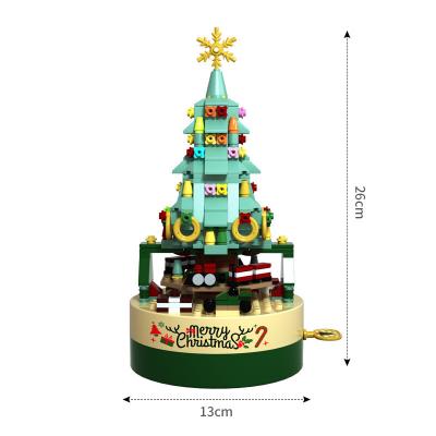 China Toy Creative Christmas Music Box Children's Small Particle Building Block Electronic Electric Rotating Colorful Music Box Music Box for sale