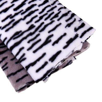 China 100% Tiger Printing Animal Soft Plush Polyester Faux Rex Rabbit Fur Fabric For Scarf Earflap Tear-Resistant Shoes for sale