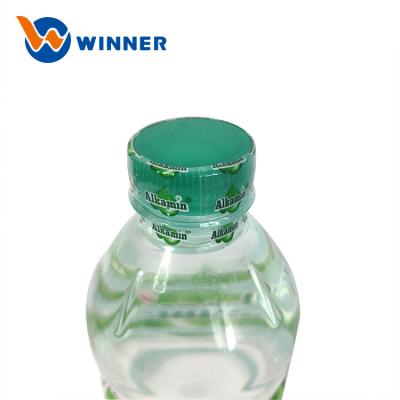 China Heat Sensitive Custom Water Bottle Cap Seal Heat Seal Shrink Wrap Seal Label Plastic Shrink Label for sale