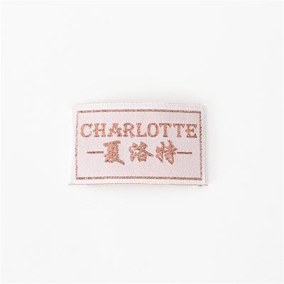 China Factory Direct Selling Fashion Twice Brocade Washable Custom Garment Woven Label Shiny Rose Gold Silk Label for sale