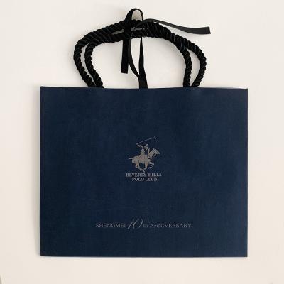 China Recycled Materials Offset Printing Gift Paper Bag Customized Art Paper Packing Bags With Luxury Blue Logos for sale