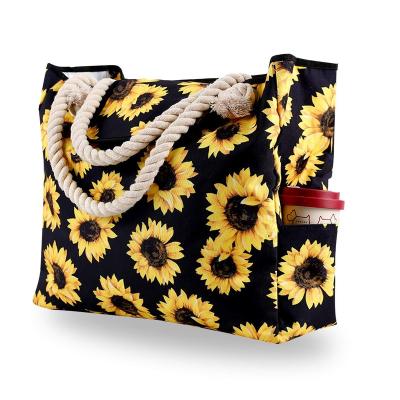 China Waterproof Summer Weekender Sunflower Travel Shopping Bag Wholesale Flamingo Flower Pattern Rope Handle Canvas Outdoor Beach Bag for sale