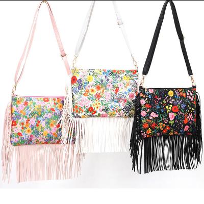 China Waterproof 2022 Summer Outdoor Travel Wholesale Leather Shoulder Bag Women Leather Tassel Cross - Body Bag Flower Pattern Handbag for sale