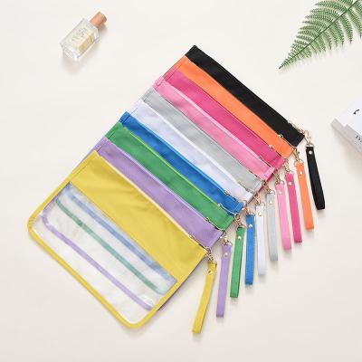 China Wholesale Customizable PVC Patch Letter Fashion Capacity Travel Toiletry Bag Stock Customizable Transparent Cosmetic Bag Storage Bag with Hand Strap for sale