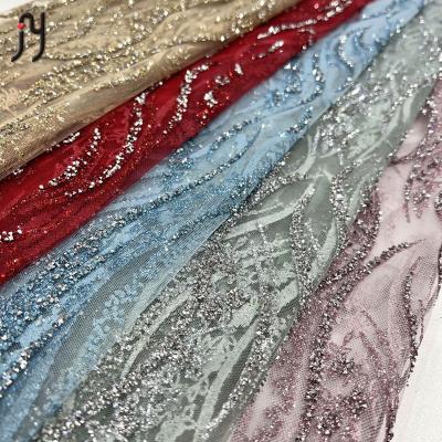 China 2022 Latest Women Viable African Lace Dresses Best Rhinestone Gold Water Proof Lace Glue Crystal Fabric For OEM Custom for sale