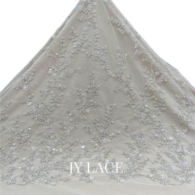 China Latest Lace 2022 Embroidery African Lace Fabric Bridal Silver White Beaded Lace Crystal Floral Sequin For OEM Custom for sale