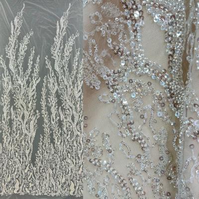 China Viable heavy silver beaded lace fabric white wedding dress fabric and turkish bridal lace material fabric for OEM custom for sale