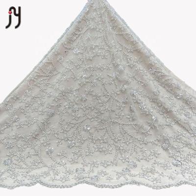 China 2022 Viable African White New Arrival Nigerian Crystal Lace Fabric 3-5mm Sequins And Silver Beaded Net Lace Fabric Bridal for sale