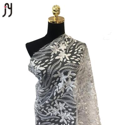 China 2021 viable african white bridal dress making European imitation rhinestone lace fabric for sale