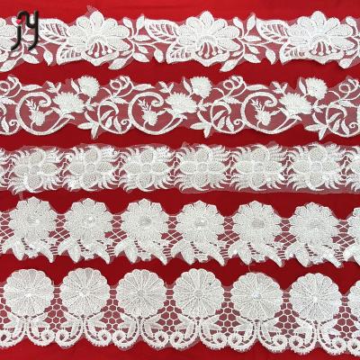 China Viable Sequin Fabric Embroidery White Pearl Lace Fabric Transparent Turkey New Product Bridal Lace for sale