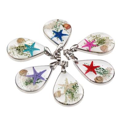 China Souvenir Pendant 2022 New Glue Drop Resin Necklace Starfish Resin Design FASHIONABLE DIY Natural Starfish Pendant Specimens for sale