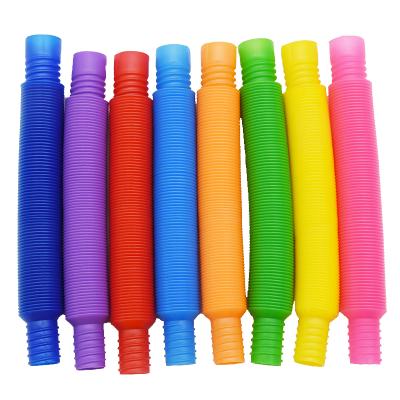 China Innovative Annealing Annealing Innovative Elastic Toys Noise Stirring Person Mini Pop Tube Educational Toys Creative Noise Tube for sale