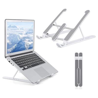 China Adjustable Cheapest Plastic Folding (Height) Adjustable Foldable Laptop Stand Portable Desk Stand for sale