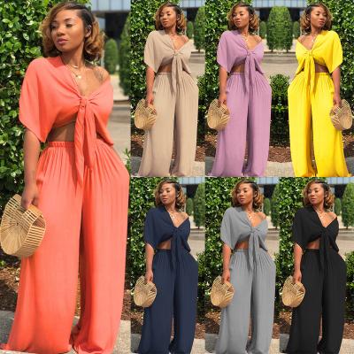 China QUICK DRY Deep V Shorts Sleeved Solid Color Leg Pant Suit 2021 Two Piece Wide Leg Suit Summer 2 Pieces Set Women Clothing for sale