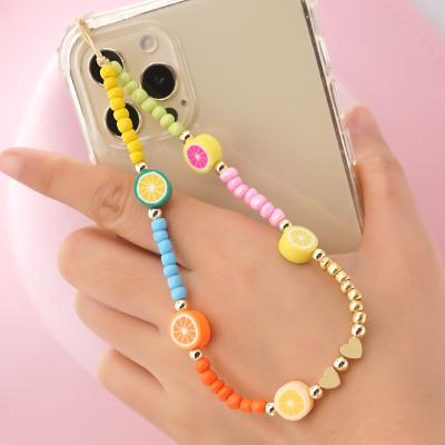 China Smiling Soft Pottery Cell Phone Chain Insti Pottery Letter Love Pottery Cell Phone Bead Acrylic Soft Handmade Wrist Lanyard Soft Chain for sale