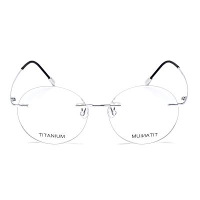 China Fashionable Transparent Funny Optical Rimless Titanium Rounded Glasses for sale