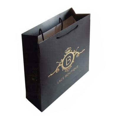 China Recyclable Logo Black Paper Gold Foil Hologram Color Small Size Shopping Bag For Jewelry Packaging for sale