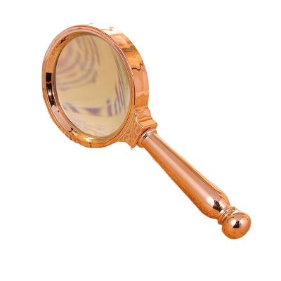 China Retro Binoculars Gold Magnifier Jewelry Appraisal Reading Handheld Magnifier For The Elderly for sale