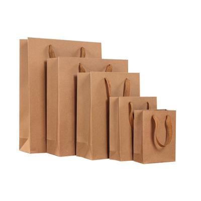 China Brown Disposable Bags Recycled Paper Logo Kraft Handles Packaging Custom T-Shirt Bag for sale