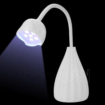 China New Design Beauty Finger Nail Lotus Flower Led Uv Nail Desk 12w Cordless High Quality Portable 12w Quick Dry Polish Lamp for sale