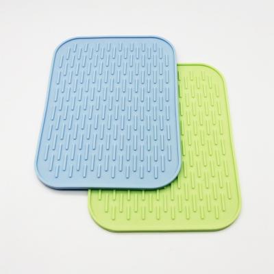 Chine Tapis chaud adapté aux besoins du client par cuisine de Tableau de silicone de FDA de pot à vendre