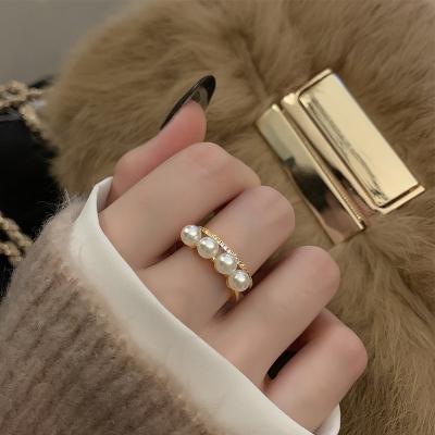 China Light CLASSIC Geometric Luxury Soft Ring Opening Pearl Metal Retro Fashion Index Ring for sale