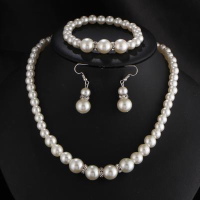 China TRENDY Jewelry Sets Fashion Imitation Pearl Earrings Necklaces Bracelets Sets Diamond Crystal Bridal Jewelry for sale