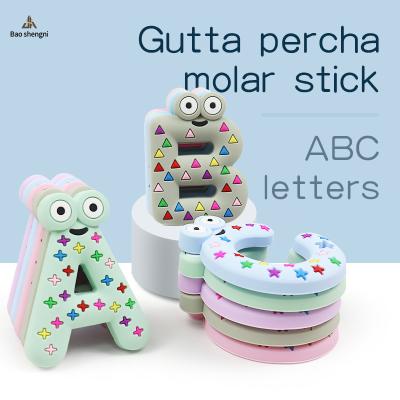 China Wholesales Non-Toxic Hand Grip Silicone Baby Alphabet Teeth Since English Alphabet Baby Teether Training Teething Toy Gift for sale