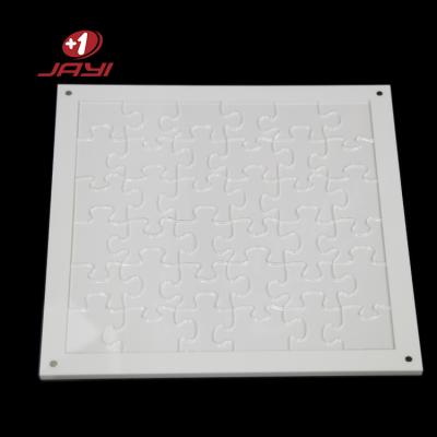 China JAYI Clear Crystal Blank Laser Cut Acrylic Jigsaw Puzzle for kids for sale