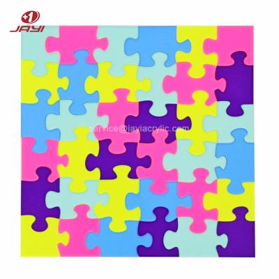 China Funny Colorful Acrylic Puzzles Customize Lucite Jigsaw Games For Kids And Adult for sale