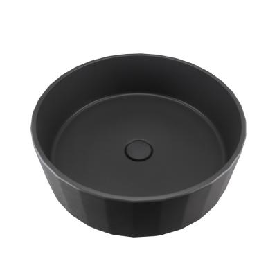 China Black Round Concrete Wash Basin With No Faucet Holes And Pop Up Drain zu verkaufen