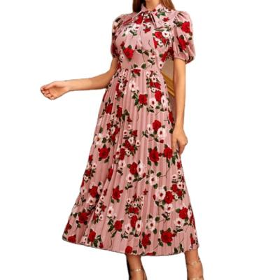 China Breathable Women's Pleated Dress Tie Neck Puff Sleeve Pleated Floral Dress Spring Fashion Style Pleated Dress for sale