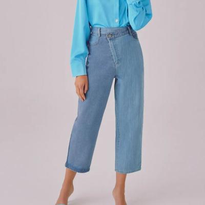 China QUICK DRY light blue cross-waisted loose straight leg jeans fashion high waist denim pants for women for sale