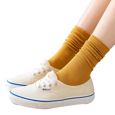 China Women Breathable Solid Color Tube Socks Cotton Pile Slouch Sock for sale