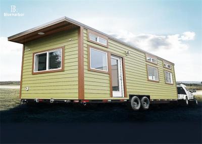 China Light Steel Structure Prefab Mini Homes Trailered Beige 3 Ton For 2-3 People for sale