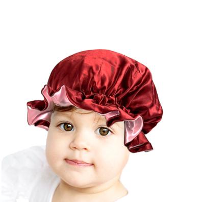 China Hot Adjustable Reversible Reversible African Silk Baby Hoods Double Layer Satin Baby Soft Hair Hats For Sleeping for sale