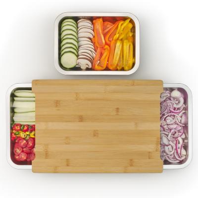 China Non Slip Sustainable Vegetable Kitchen Bamboo Cutting Board With Removable Steel Trays Storage for sale