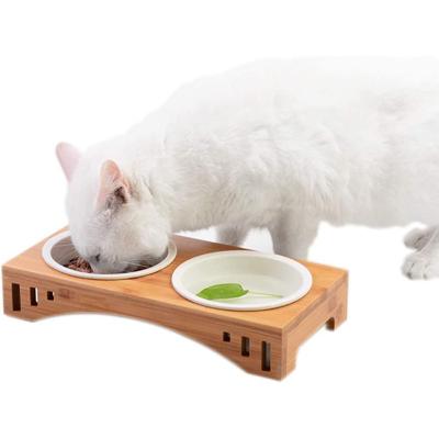 China Viable Prevent Small Ceramic Food Pet Bowls And Feeders 14cm Diameter With Bamboo Rack for sale