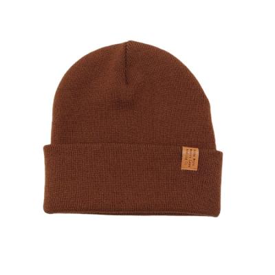 China COMMON Winter Warm Knitted Beanie Hat With Custom Embroidery Logo Design for sale