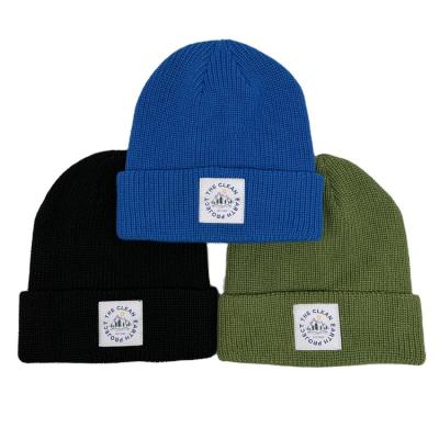 China Common Rib Multi Color Embroidery Bulk Acrylic Warm Outdoor Warm Running Winter Knitted Beanies Hats for sale