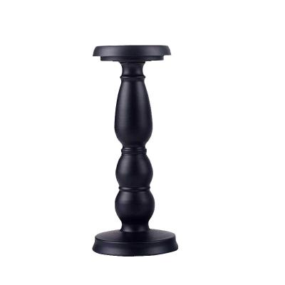 China Home Decoration Black Resin Metal Pillar Candlestick Holders For Table Centerpiece for sale