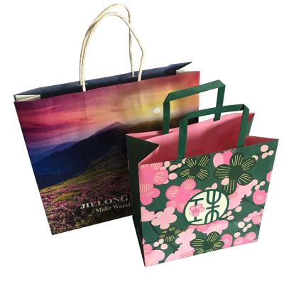 China Recycled Materials Factory Custom Printed Luxury Kraft Paper Gift Shopping Paper Bag For Retail for sale