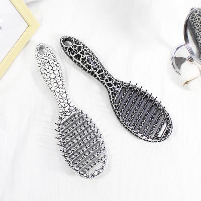 China All ABS Plastic Nylon Plastic Joint Massager Anti Teeth Hair Growth Massage Comb Hair Massager Comb for sale