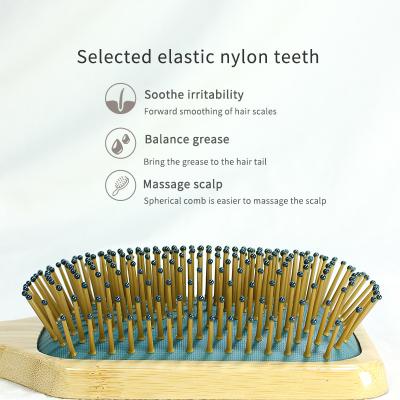 China All Round Soft Electric Scalp Tooth Head Massage Comb Bamboo Wooden Hair Cushion Massage Comb for sale