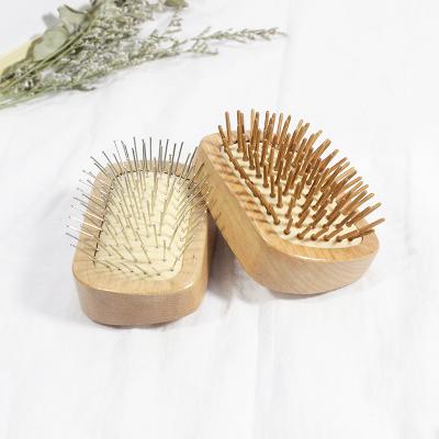 China Portable Airbag Mini Wooden Comb All Wood Teeth Plating Hairdressing Comb for sale