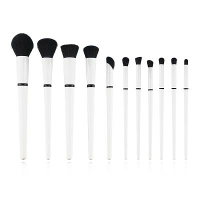 China Angular Blush Professional Makeup Brush Set 11pcs Makeup Brush Set White Professional Cosmetic Private Label Design New for sale