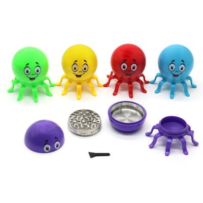 China Creative Zinc Alloy Octopus Smoking Smoking Herb Grinder Luminous Plastic Hand Manual Accessories New Design Props for sale